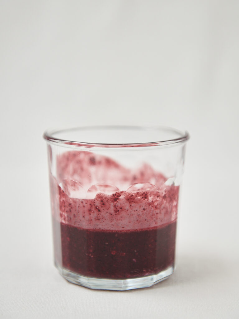 overnight oats with blueberries in a glass jar