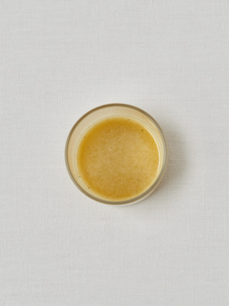 glass with dressing mixed