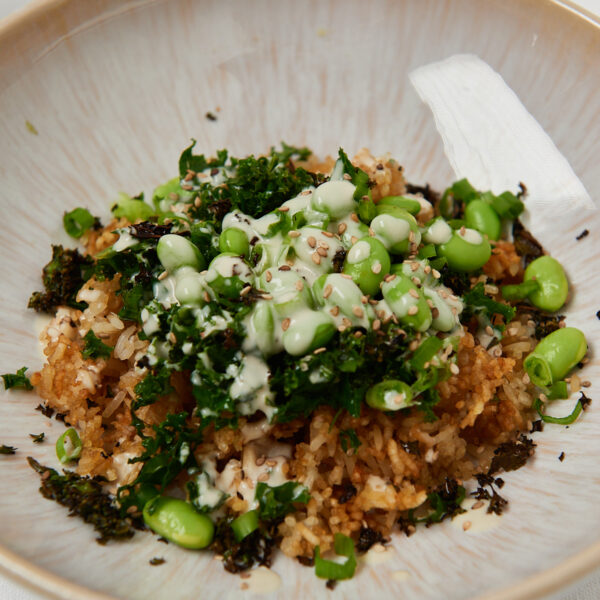 bowl with crispy rice, edamame, kale and delicious tahini dressing