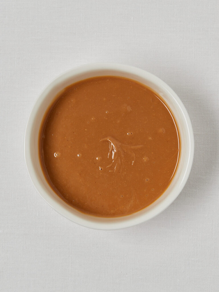 white bowl with peanut butter