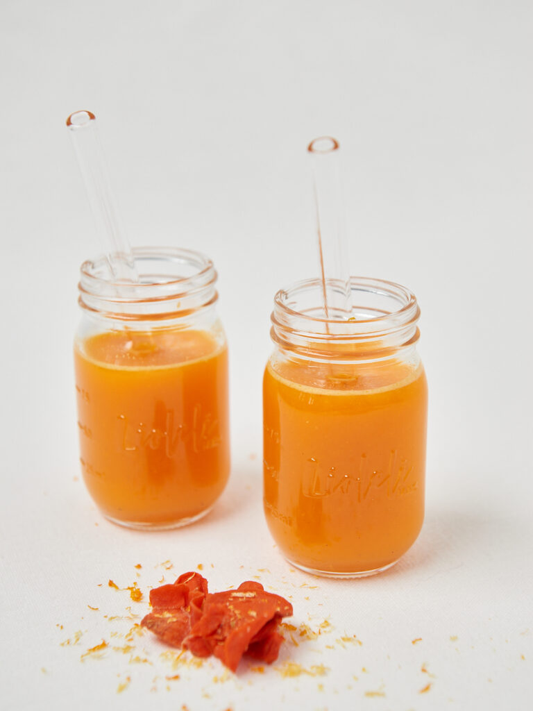 golden glow shots in small jars with straws