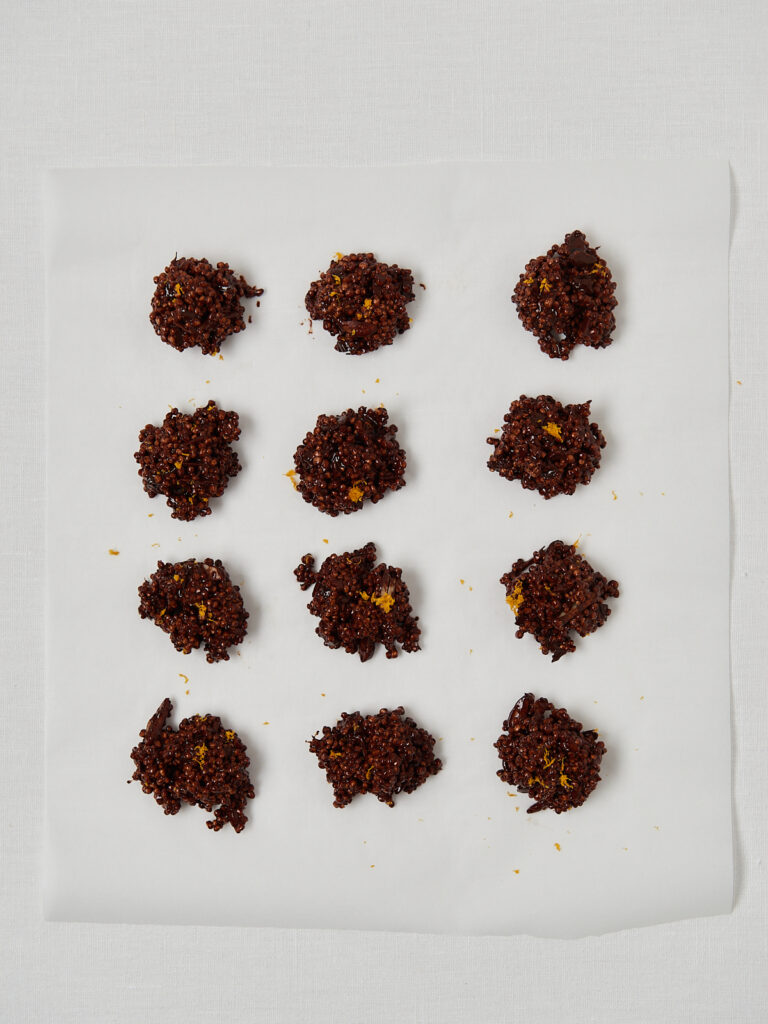 chocolate quinoa bites in 4 rows - three bites in each row