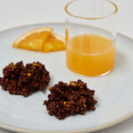 2 crunchy chocolate bites and one glas orange juice