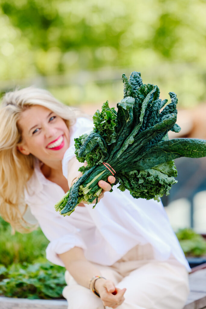 Svenja with kale flowers
