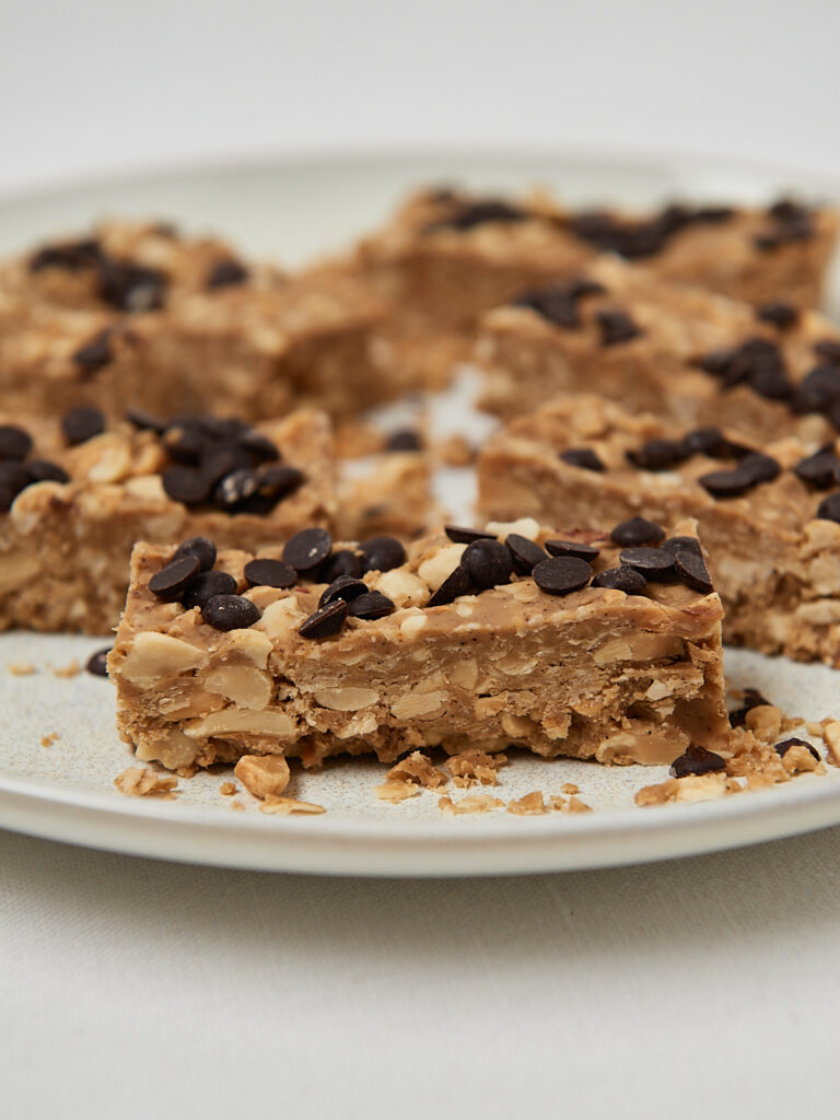 Healthy oat bars arranged on ceramic plate