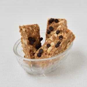 Oat peanut butter bars served in small bowl, clean eating dessert